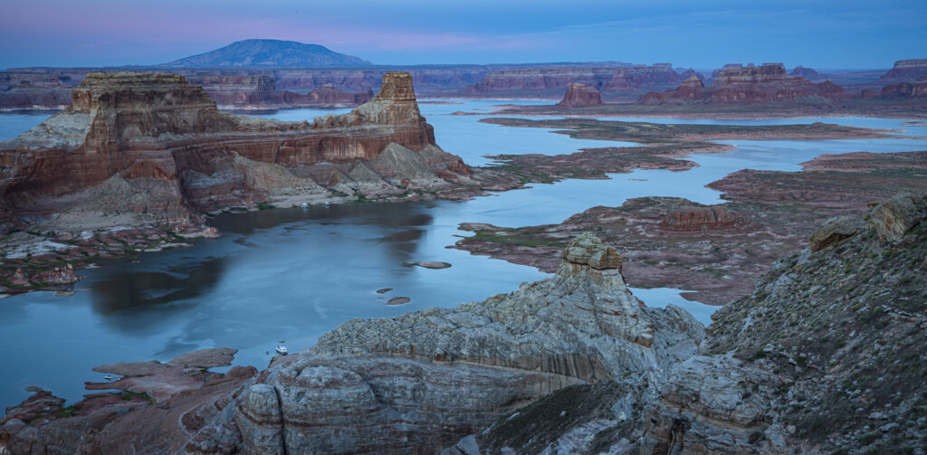 An expansive view of Lake Powel at sunset.
