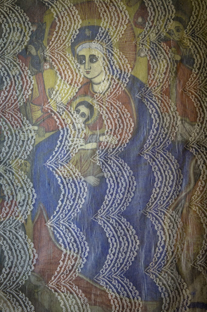 A portrait of Mary painted on the wall of the church at Azwa Miriam, a 14th centuary monastory on a peninsula of Lake Tana. The lace covering is out of reverance.