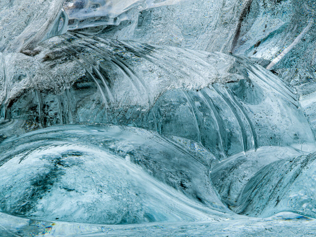 Beautiful patterns form in the walls of the Aurora ice cave in Iceland's J&ouml;kuls&aacute;rl&oacute;n glacier.