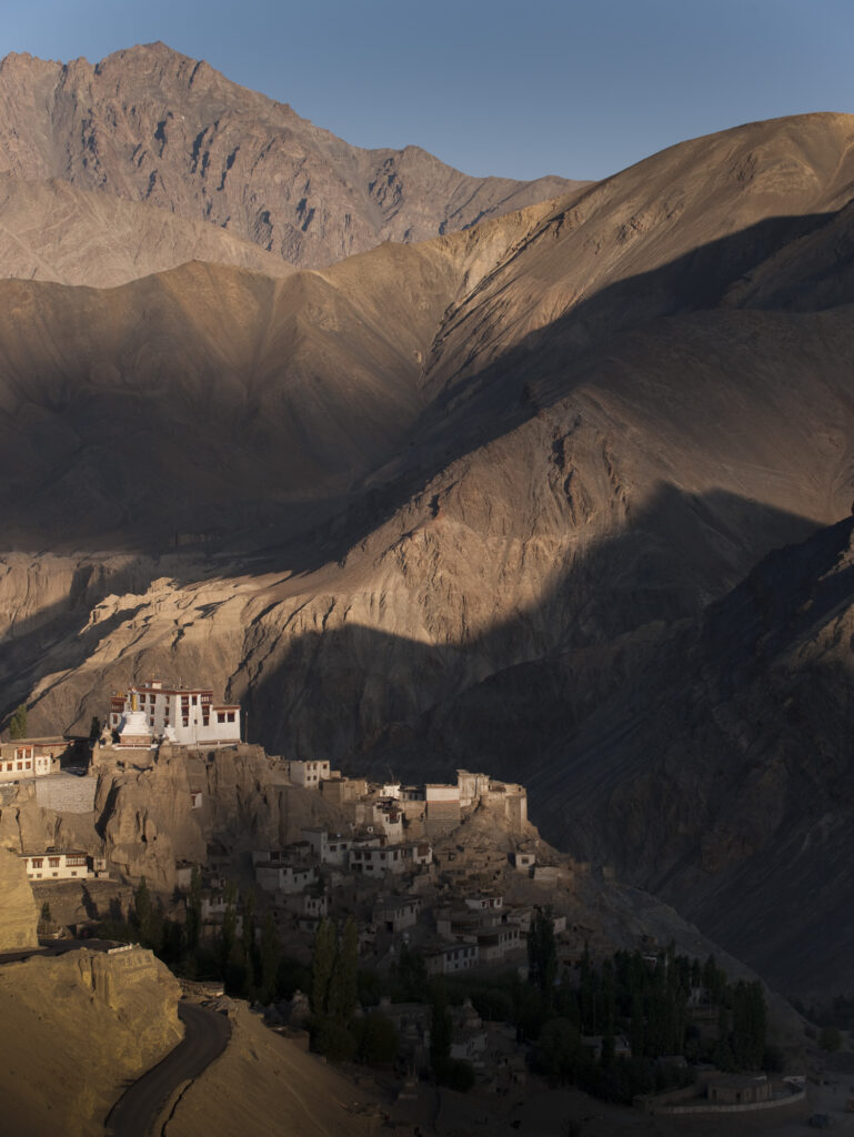 Lamayuru Monestary sits nestled among mountains in Ladakh.