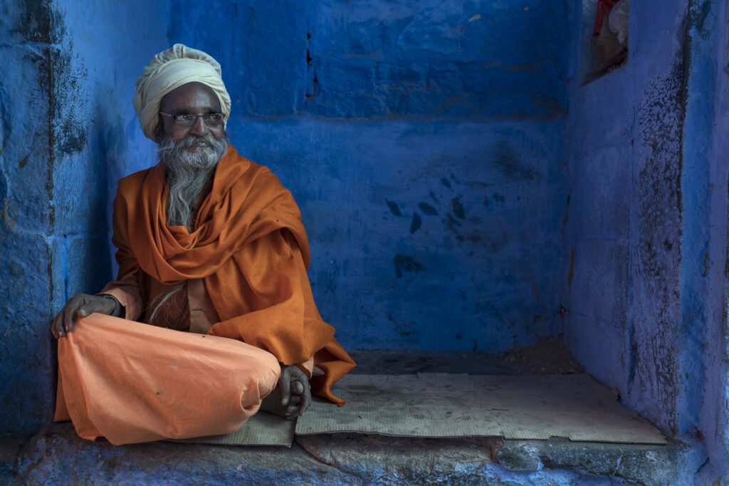 An old man sits and whiles away the day in Johdpur.