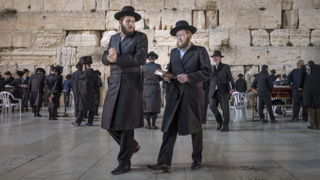 Orthodox Jewish men at the "western wall"