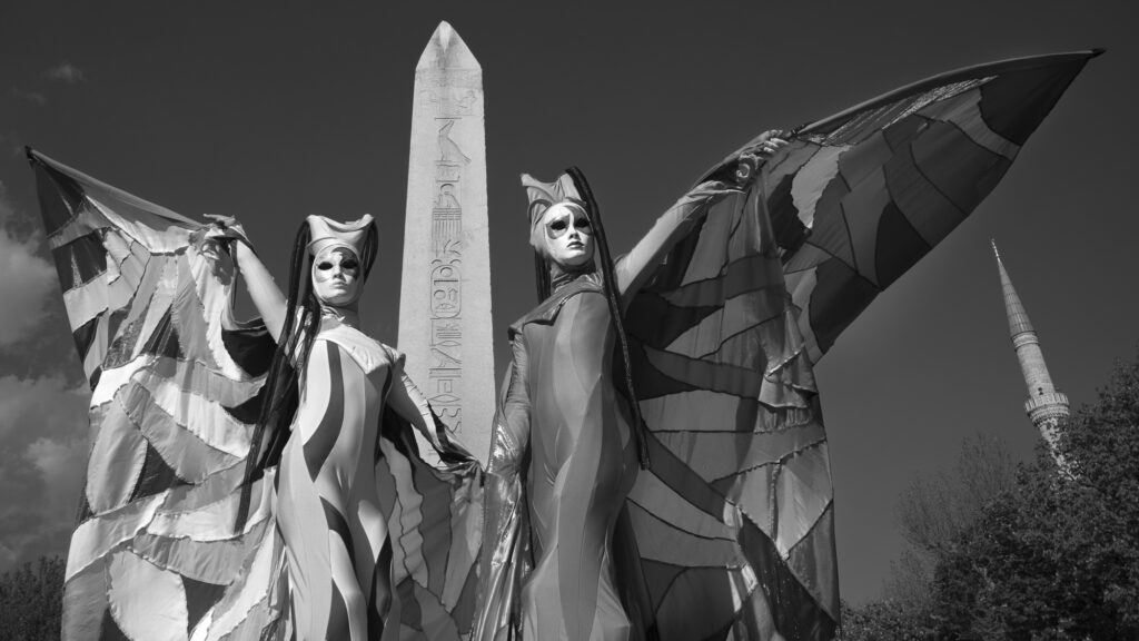 Stilt walkers at The Obelisk of Theodosius