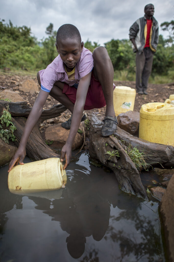 Gathering water is a morning chore for both Maasai boys and girls.
