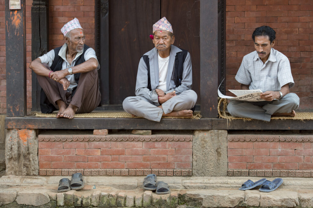 Old men while away the morning near Bhaktapur&rsquo;s Durbar Square