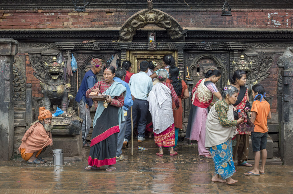Worshippers at a temple near Bhaktapur&rsquo;s Durbar Square