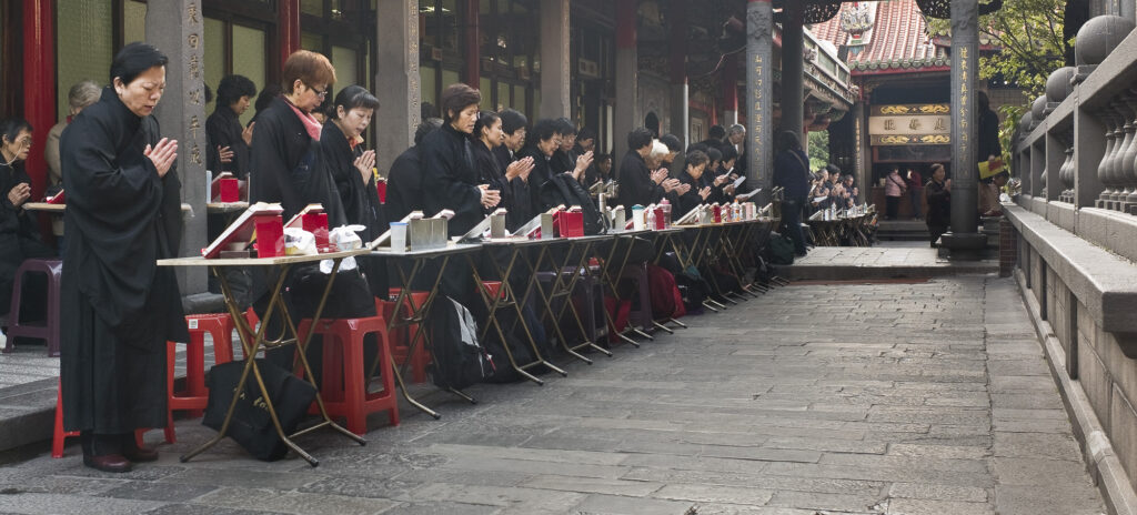 Saturday morning prayers, Longshan Temple, Taipei, Taiwan