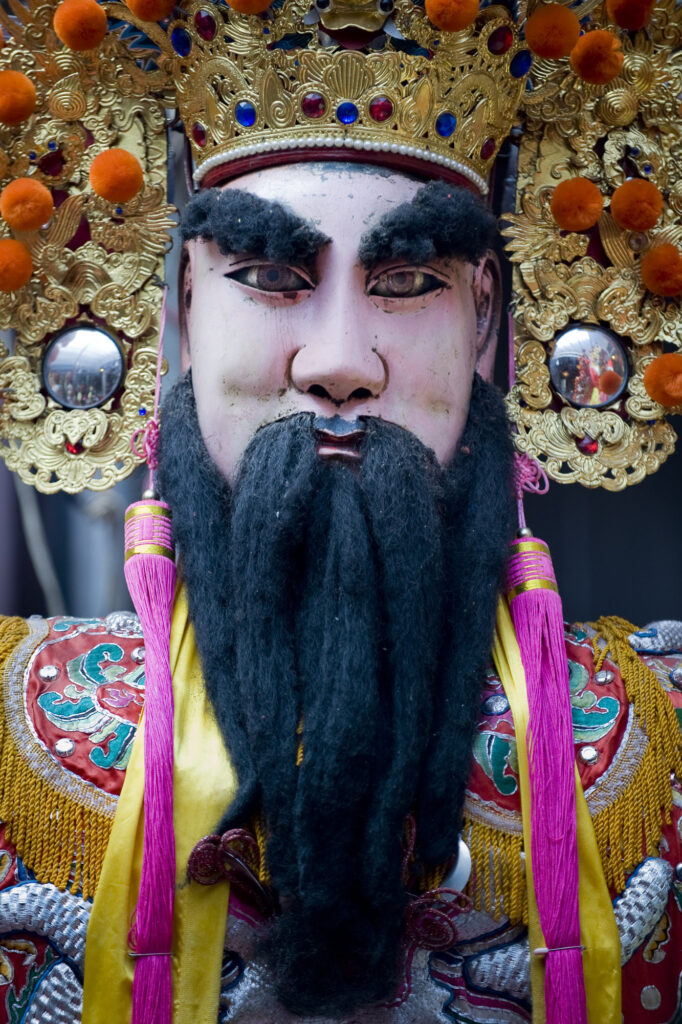 A deity in a temple wall in Taipei, Taiwan