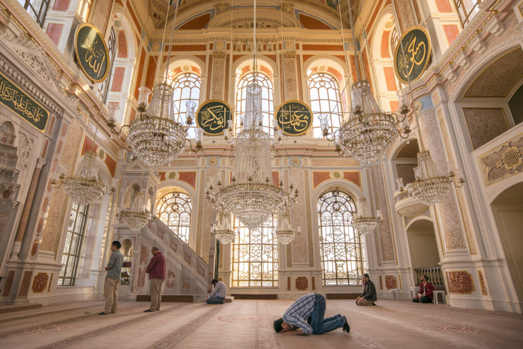 Men praying in a mosque in Istanbul