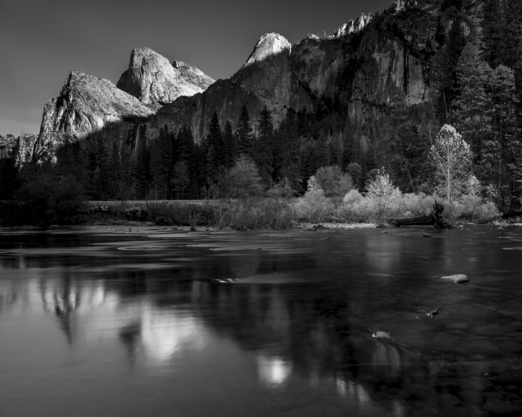 Three Brothers reflected in the Merced River, Yosemite