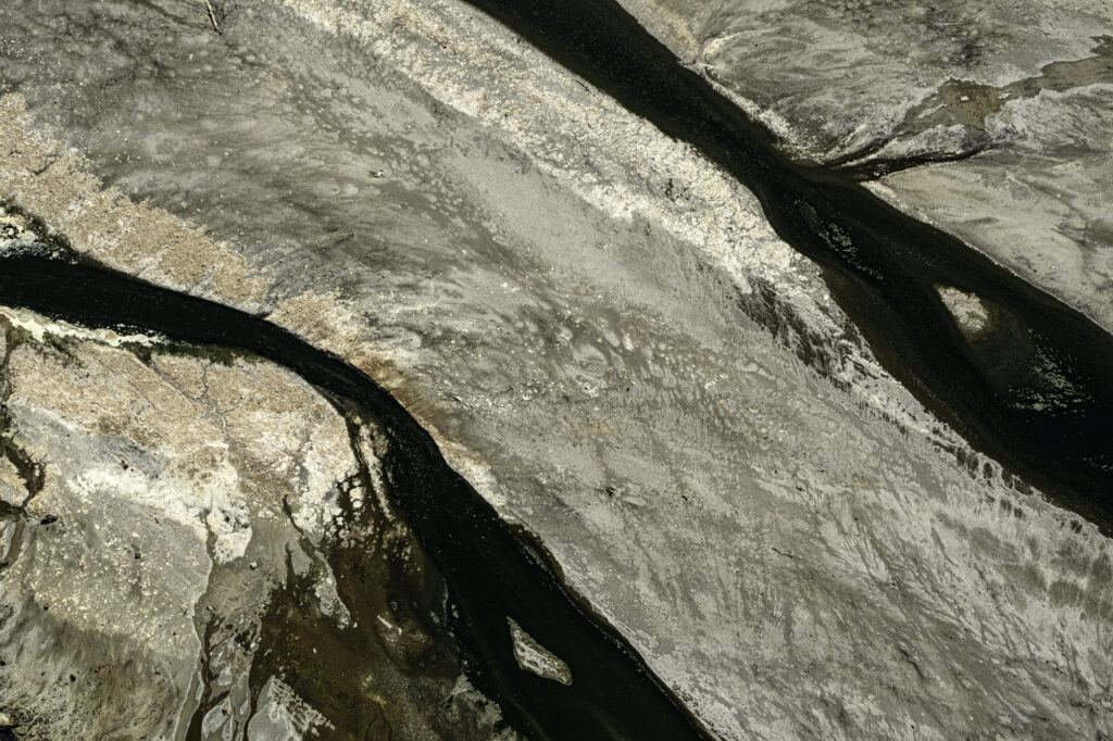 Algae interacts with the alkaline soda in Lake Magadi to create incredible patterns.