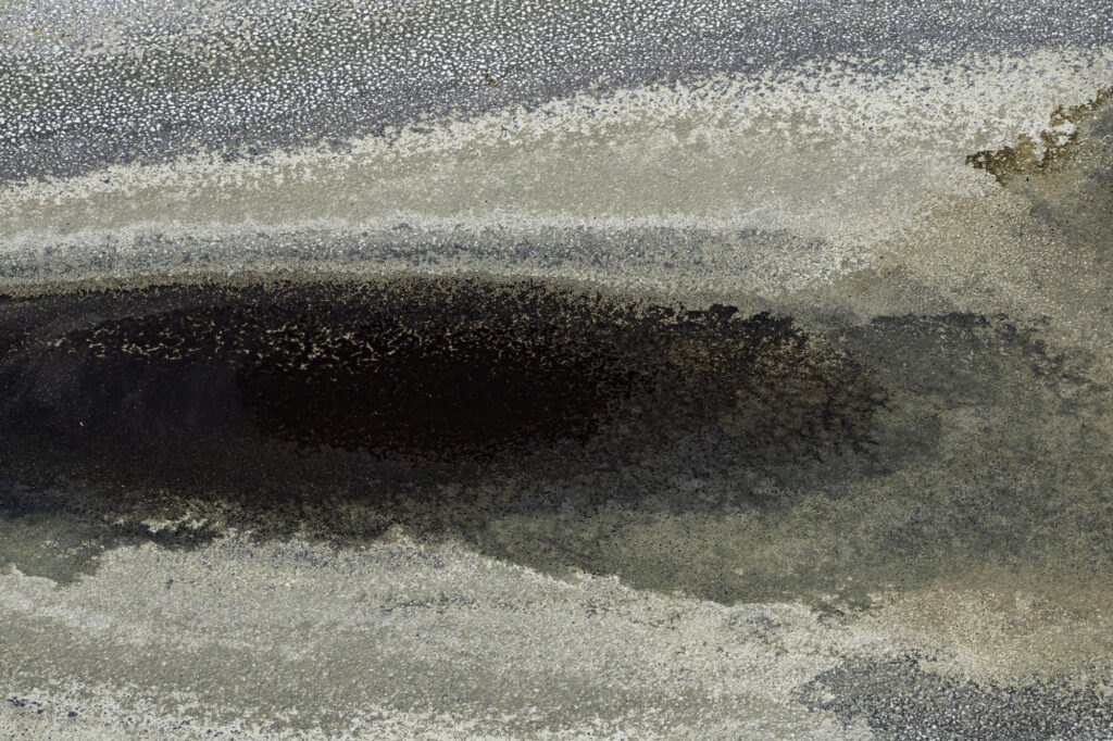 Algae interacts with the alkaline soda in Lake Magadi to create incredible patterns.