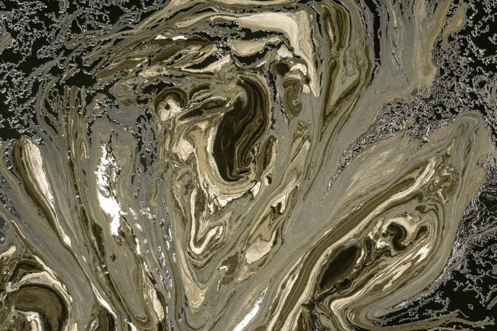 Algae interacts with the alkaline soda in Lake Magadi to create incredible patterns.