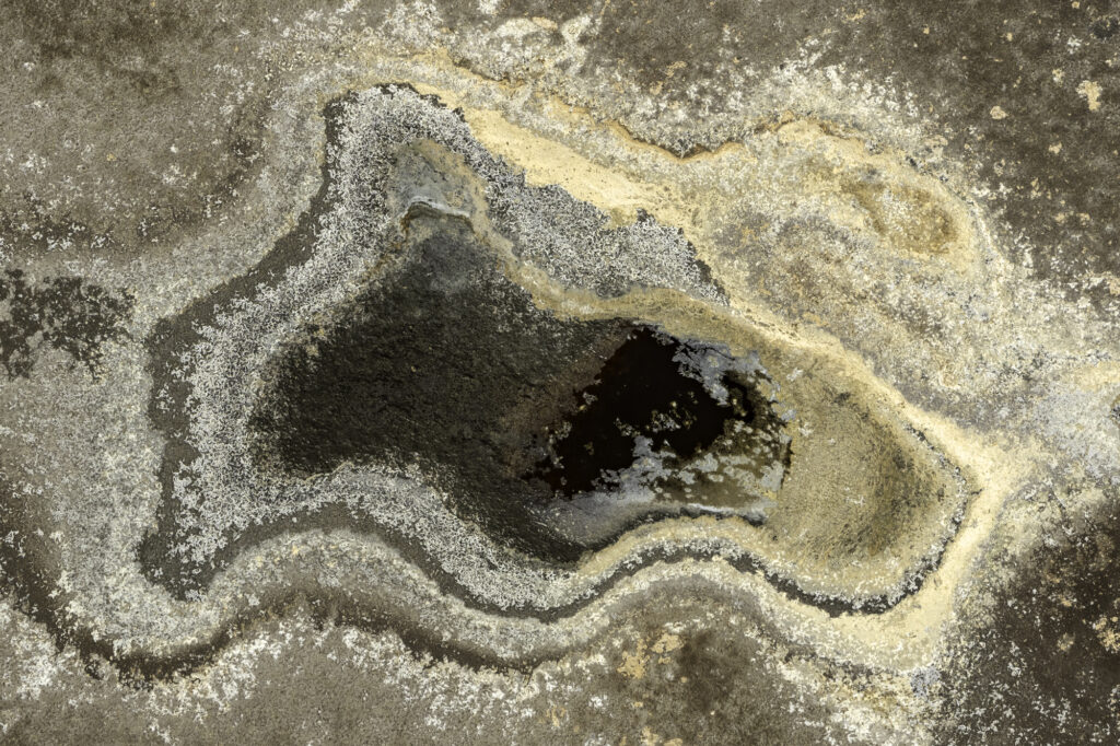 Algae interacts with the alkaline soda in Lake Magadi to create incredible patterns.