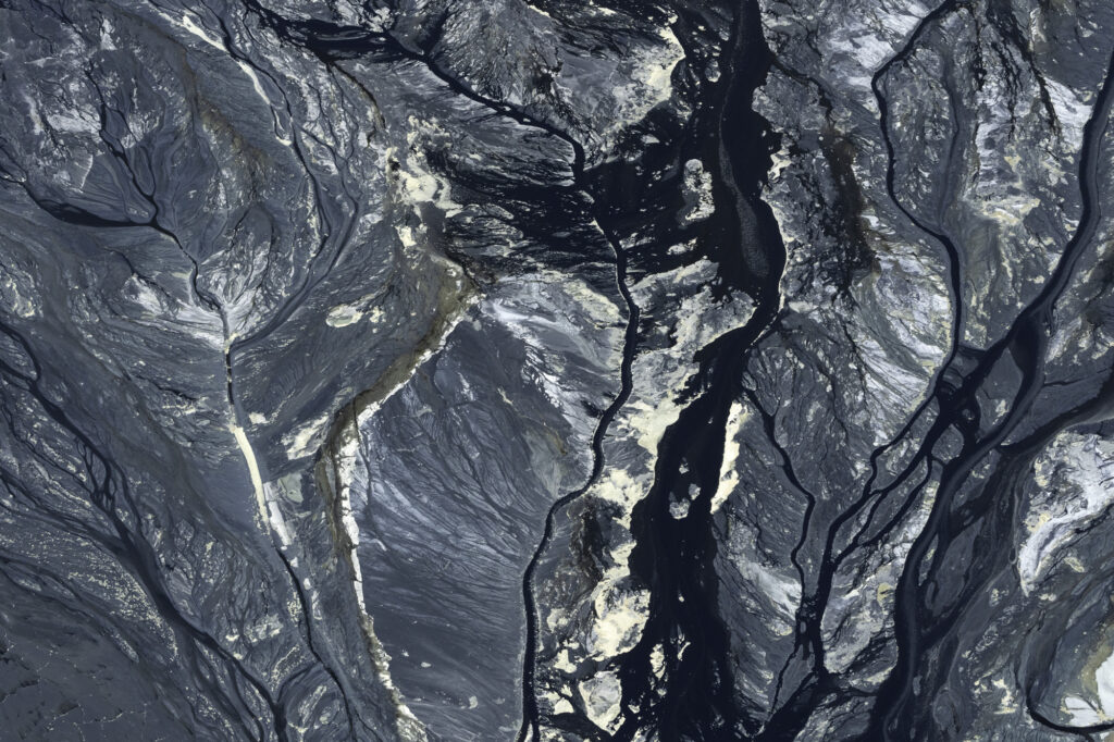 Algae interacts with the alkaline soda in Lake Magadi to create incredible patterns.