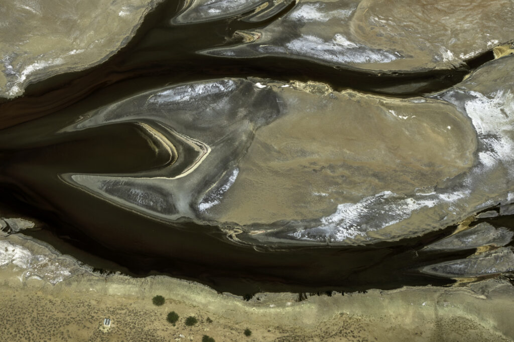 Algae interacts with the alkaline soda in Lake Magadi to create incredible patterns.
