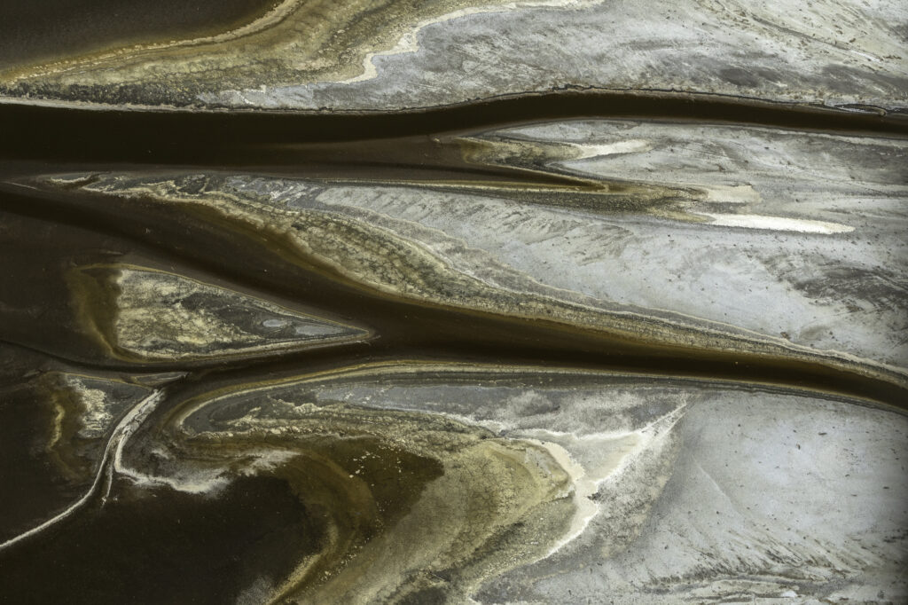 Algae interacts with the alkaline soda in Lake Magadi to create incredible patterns.